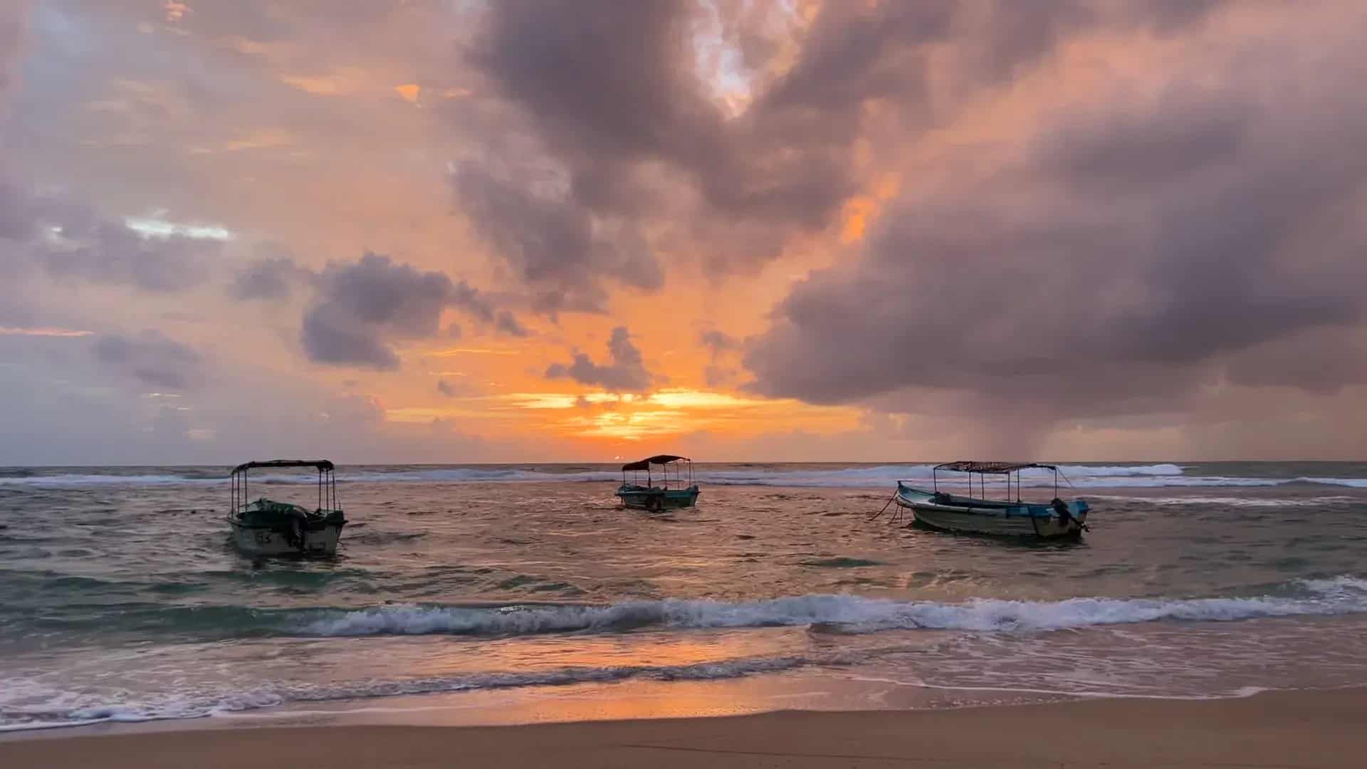 Sunset with fishing boats on Sri Lanka’s south coast