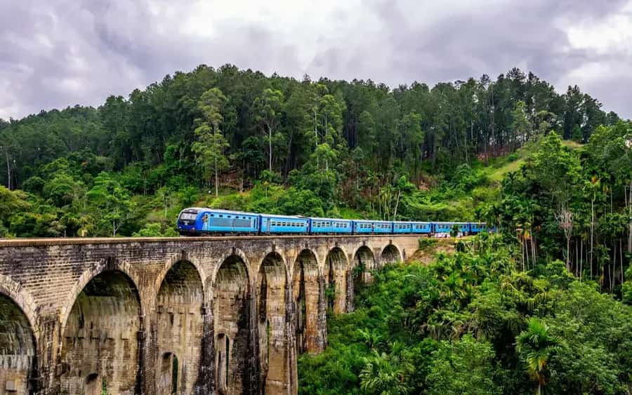 Train crossing the Nine Arches Bridge near Ella