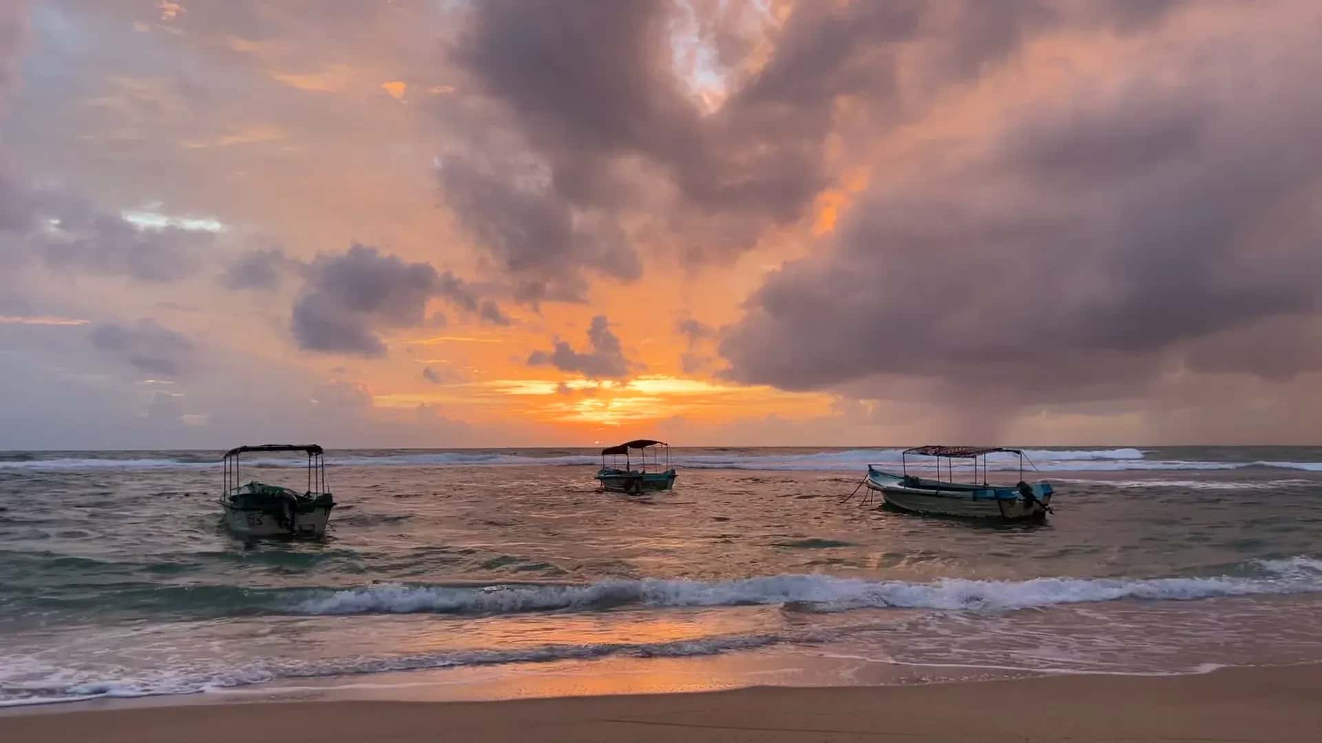 Sunset with fishing boats on Sri Lanka’s south coast