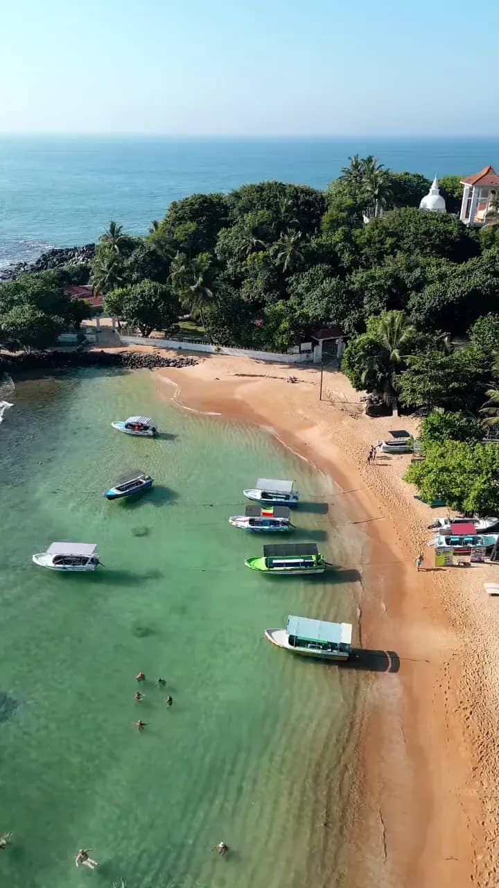 Bay with boats on the south coast from the air